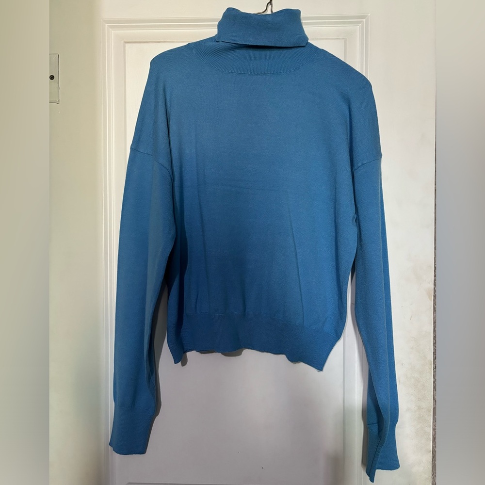 Light Blue turtleneck. NWOT